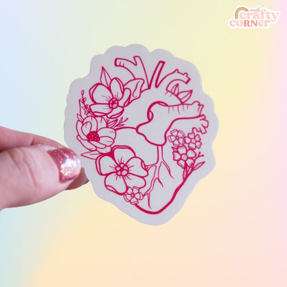 Close-up of Floral Anatomical Heart red matte sticker showing matte finish and details by Mel's Crafty Corner